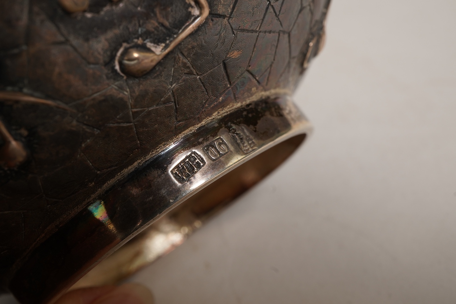 A pair of late 19th/early 20th century Chinese Export white metal two handled globular vases, by Wang Hing, Hong Kong